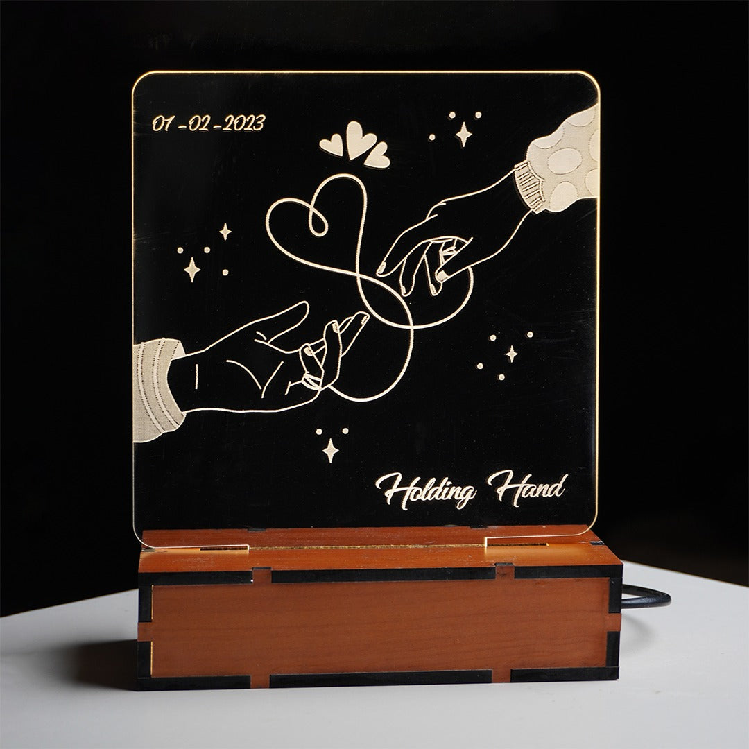 Engraved LED acrylic plaque of holding hands under stars for long-distance love